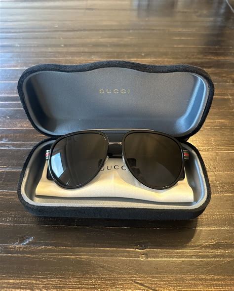 Gucci GG0447S Sunglasses .